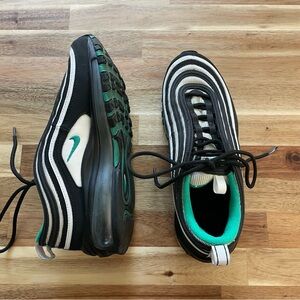 Black and White Sneakers with Green Accents